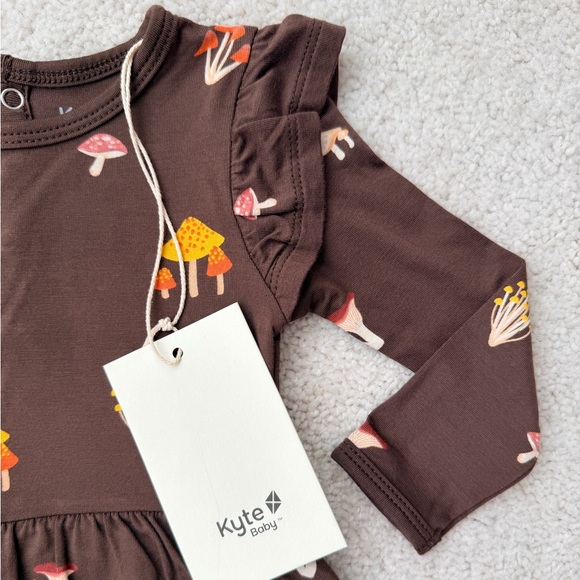 Kyte Baby Long Sleeve Twirl Bodysuit Dress in Brown Mushroom Print - Picture 4 of 12